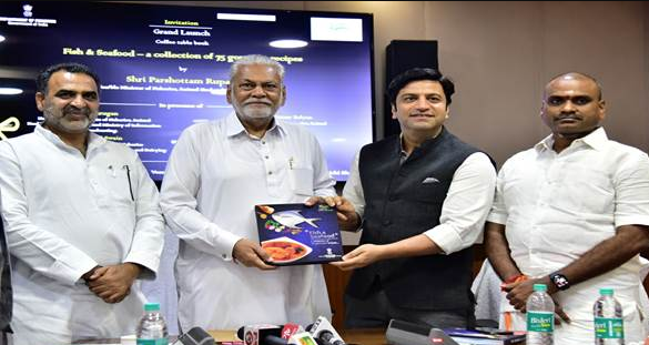 Parshottam Rupala launches culinary coffee table book on fish & seafood